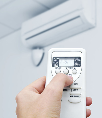 Reversible air conditioning and heat pump